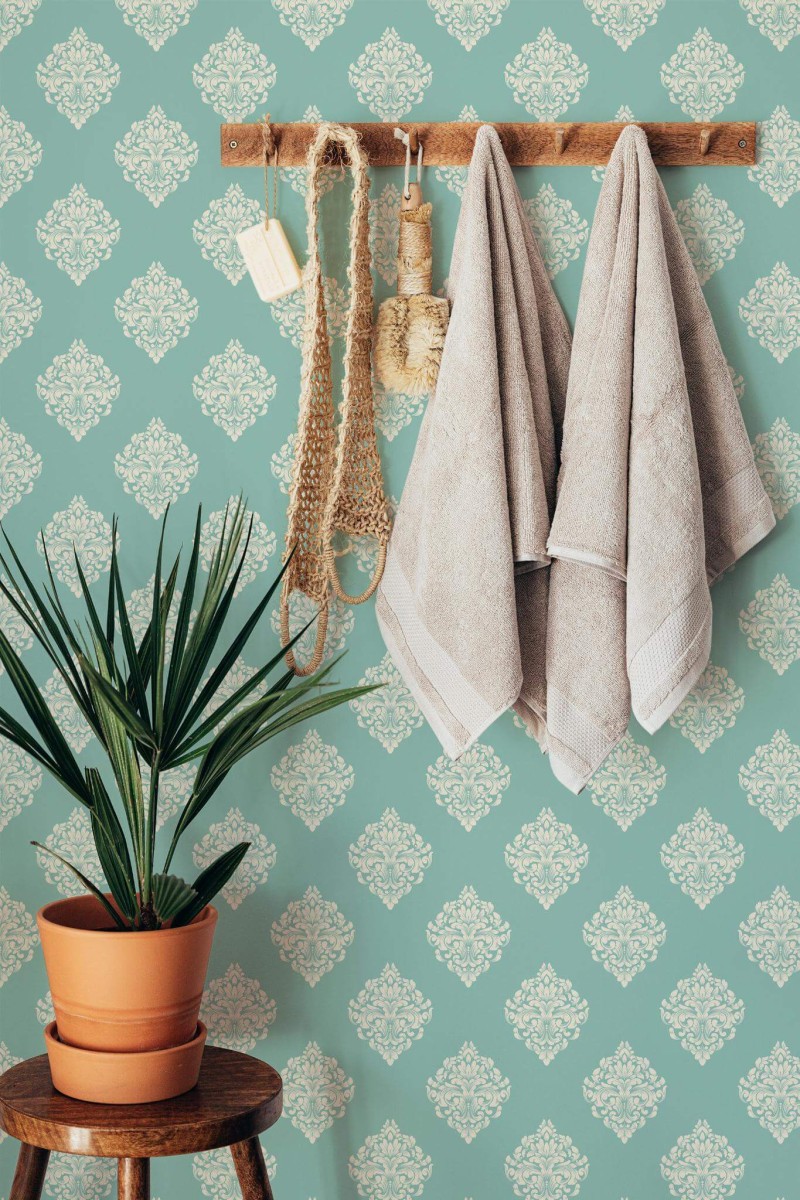 Boho style bathroom decorated with Green damask peel and stick wallpaper