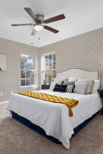 Fancy Walls light greige peel and stick wallpaper with leopard print