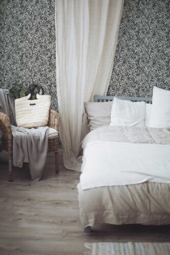 Self-adhesive greige leopard animal print wallpaper by Fancy Walls