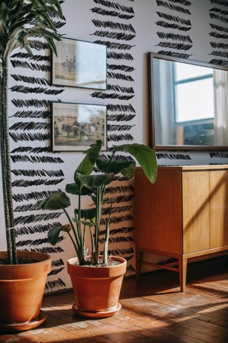 Mid-century modern style living room decorated with Hand drawn herringbone peel and stick wallpaper