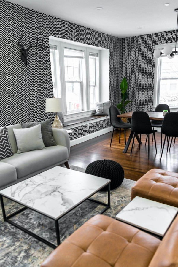 Mid-century modern scandinavian style living dining room decorated with Hand drawn pattern peel and stick wallpaper