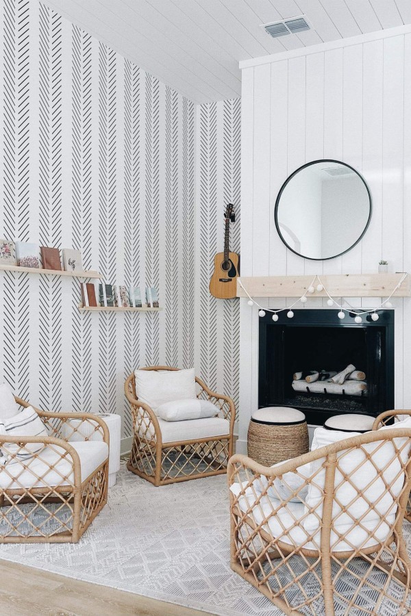 Minimal bohemian style living room decorated with Herringbone peel and stick wallpaper