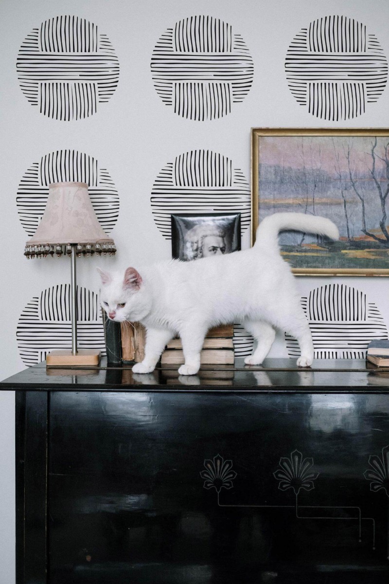 Industrial style music room decorated with Large abstract circle peel and stick wallpaper