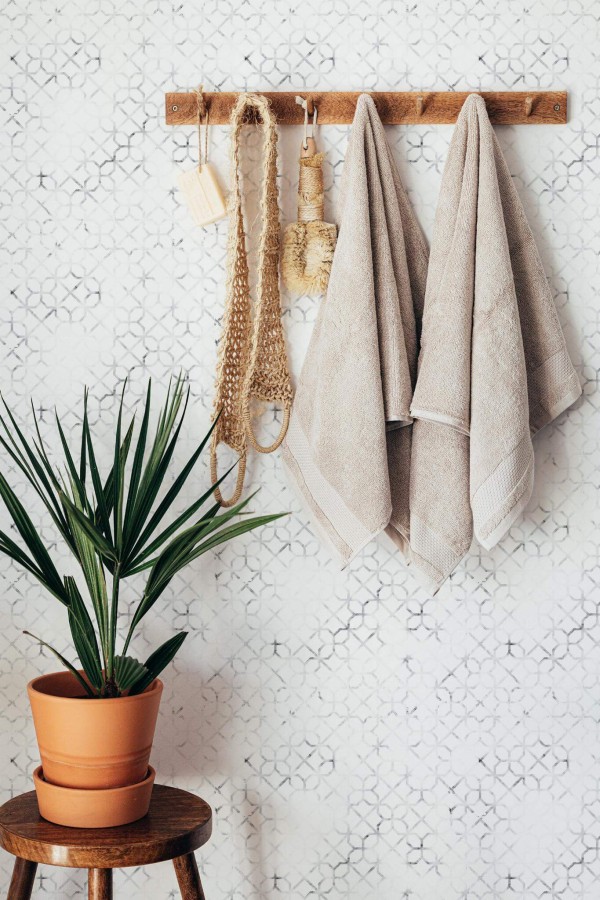 Boho style bathroom decorated with Marble morocco peel and stick wallpaper