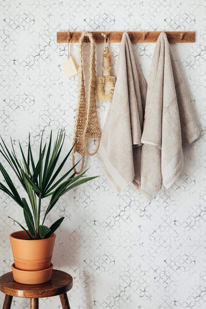 Boho style bathroom decorated with Marble morocco peel and stick wallpaper