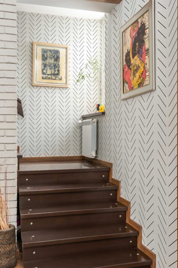 Fancy Walls traditional wallpaper showcasing bold and clean chevron stripes