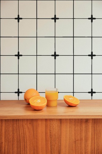 Mid-century style living room decorated with Minimalist tile peel and stick wallpaper