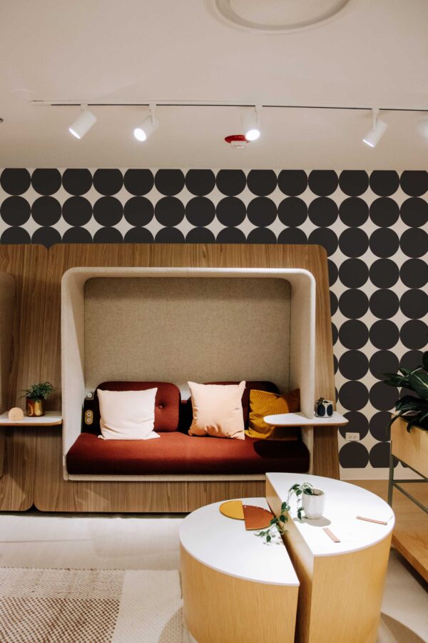 Bold black and white peel and stick wallpaper by Fancy Walls with large dot pattern