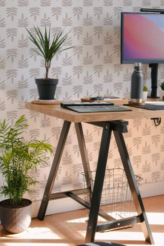 Scandinavian style home office decorated with Neutral beige leaf peel and stick wallpaper
