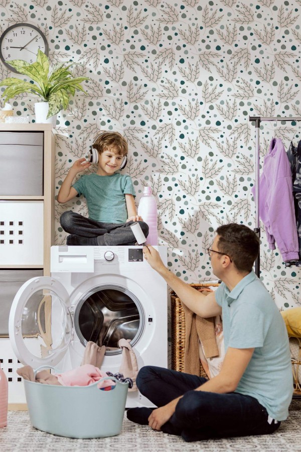 Scandinavian style laundry room decorated with Neutral leaf peel and stick wallpaper