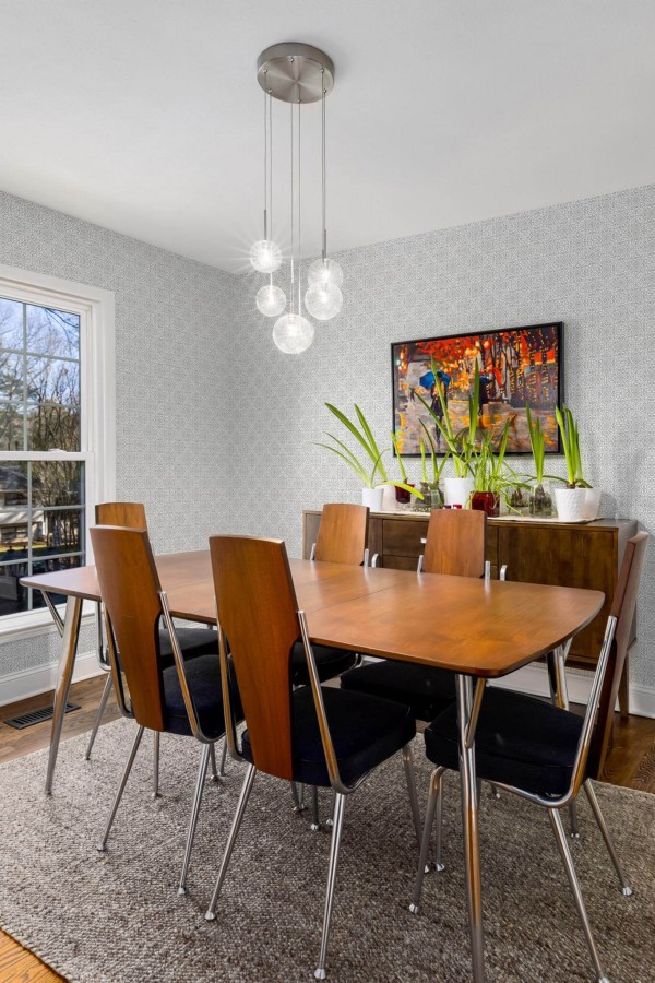 MId-century modern style dining room decorated with Oriental peel and stick wallpaper