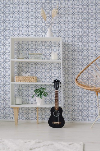 Minimal boho style living room decorated with Ornamental blue peel and stick wallpaper