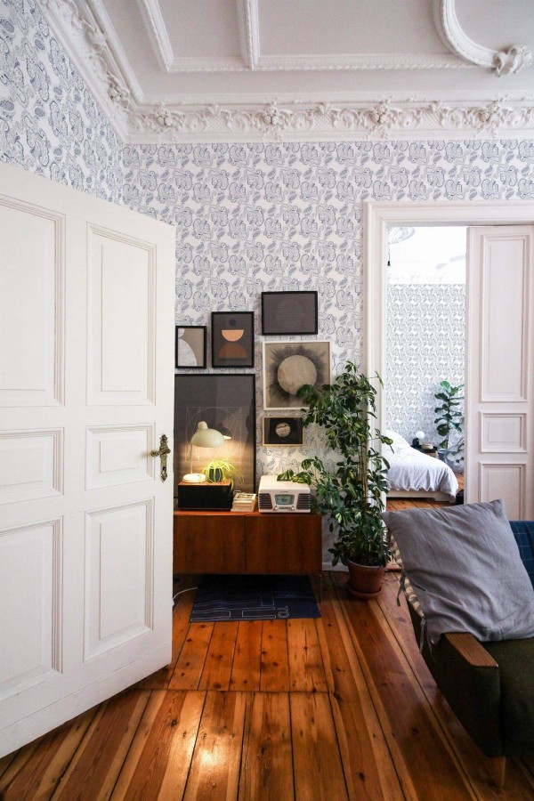 Mid-century modern luxury style living room and bedroom decorated with Paisley peel and stick wallpaper