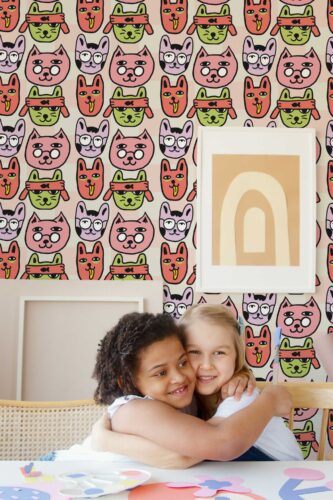 Fancy Walls self-adhesive wallpaper with doodle cats on pink