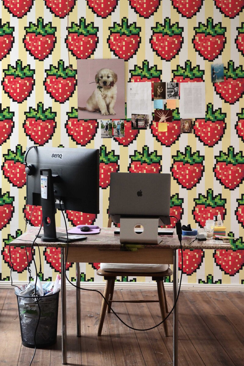 Fancy Walls self-adhesive wallpaper with striped background and red strawberries