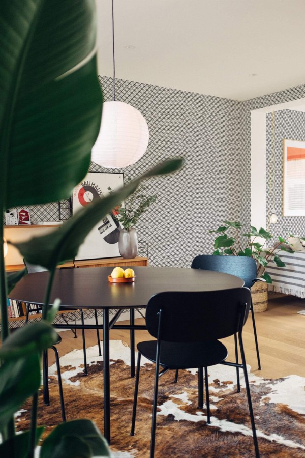 Scandinavian style dining room decorated with Plaid peel and stick wallpaper