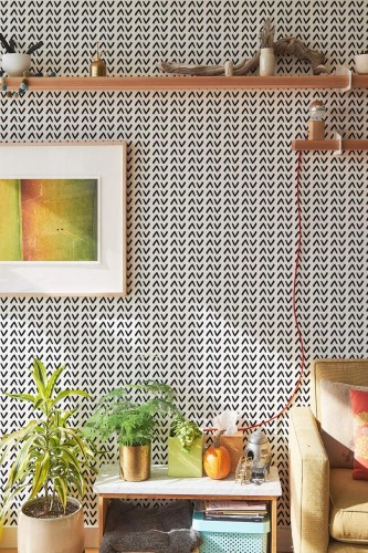 Southwestern style living room decorated with Scandinavian peel and stick wallpaper