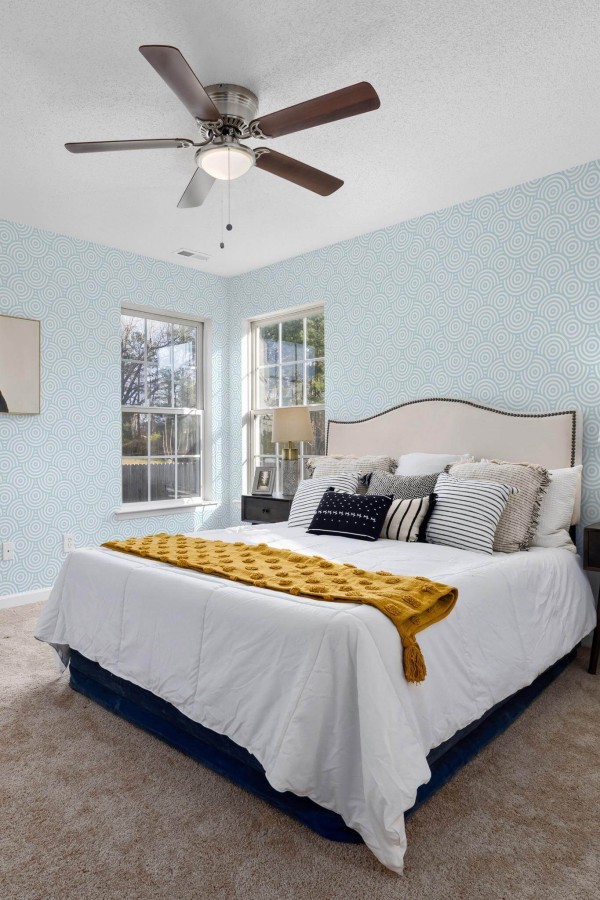Eastern European style bedroom decorated with Seamless circles peel and stick wallpaper