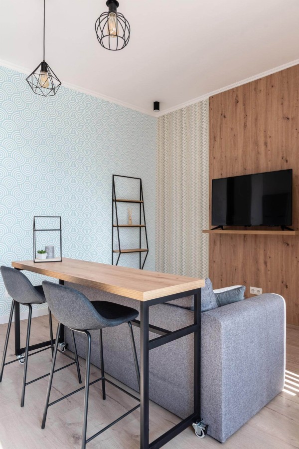 Scandinavian style open living room decorated with Seamless circles peel and stick wallpaper