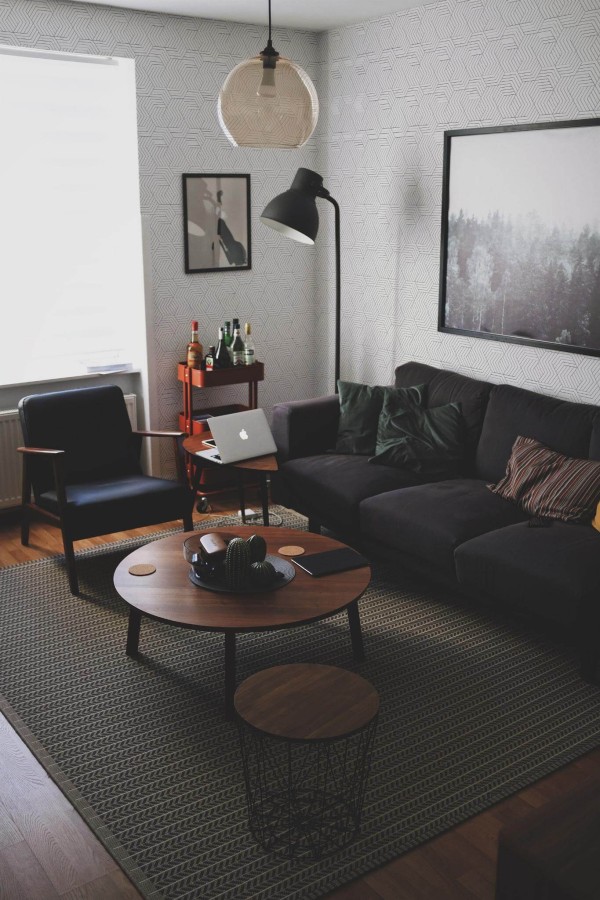 Modern dark industrial style living room decorated with Seamless modern geometric peel and stick wallpaper