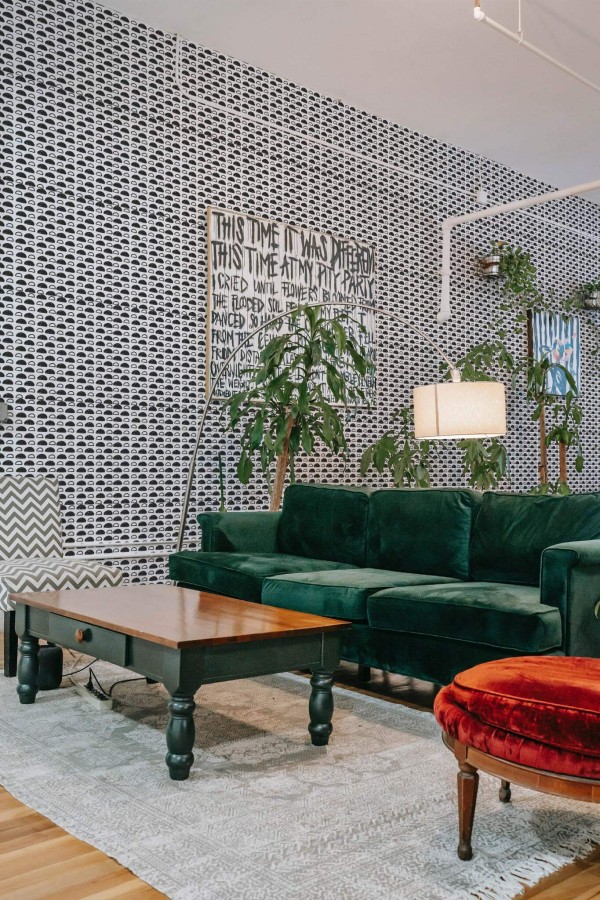 Bold eclectic style living room decorated with Semicircle peel and stick wallpaper and emerald green sofa
