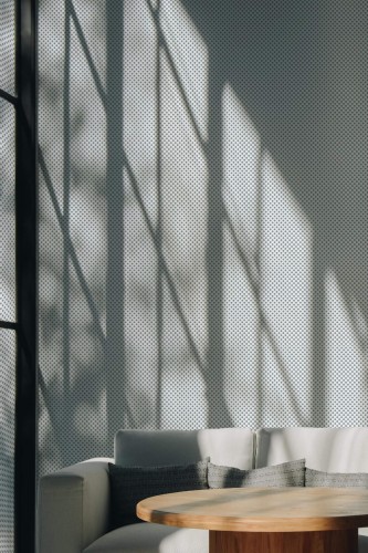 Scandinavian style living room decorated with Small polka dot peel and stick wallpaper