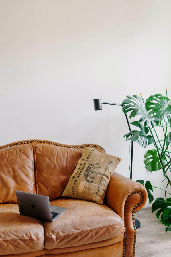 Mid-century modern style living room decorated with Solid White peel and stick wallpaper