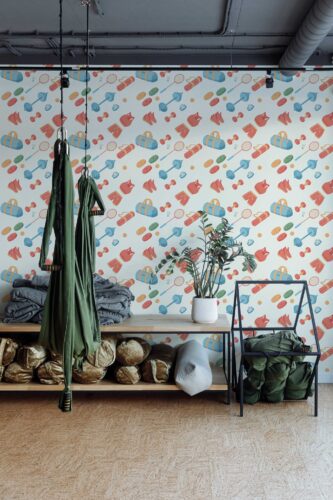 Fancy Walls self-adhesive wallpaper with gym equipment pattern