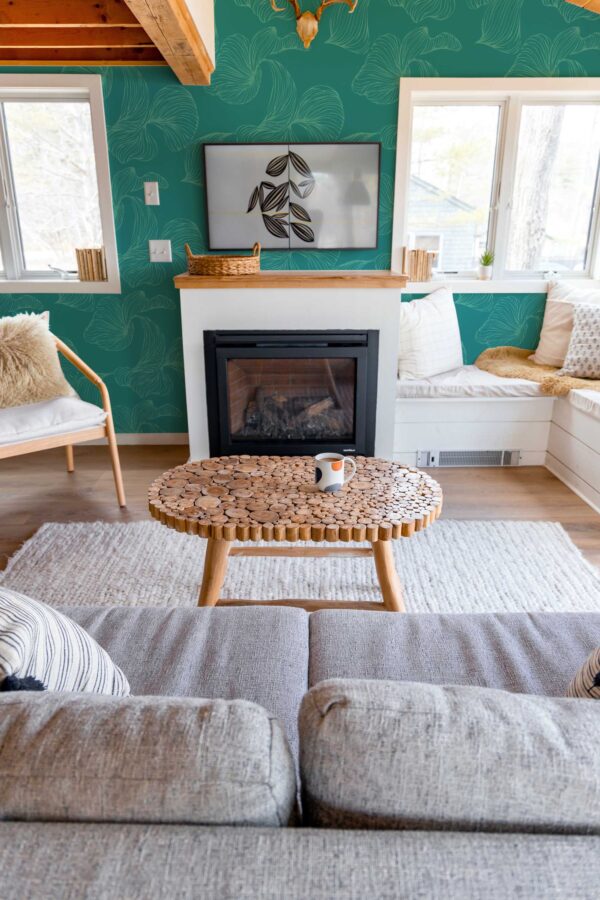 Fancy Walls removable wallpaper featuring teal organic leaf print
