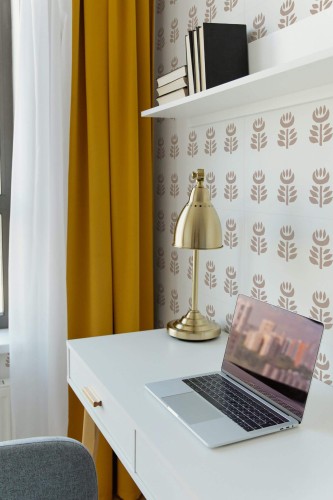 Scandinavian style home office decorated with Terracotta floral peel and stick wallpaper