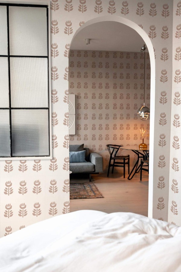 Modern scandinavian style living room decorated with Terracotta floral peel and stick wallpaper