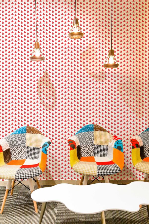 Red triangle peel and stick wallpaper by Fancy Walls