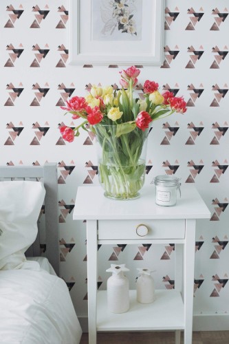 Farmhouse style bedroom decorated with Triangle peel and stick wallpaper