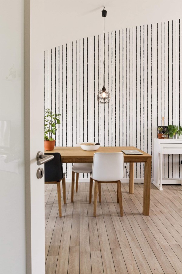 Minimal farmhouse style dining room decorated with Vertical Brush stroke lines peel and stick wallpaper