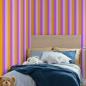 Fancy Walls self-adhesive wallpaper in dynamic retro stripe motif. Bright Stripes peel and stick or non-pasted playful wallpaper for walls