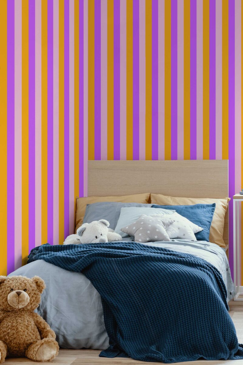 Fancy Walls self-adhesive wallpaper in dynamic retro stripe motif. Bright Stripes peel and stick or non-pasted playful wallpaper for walls