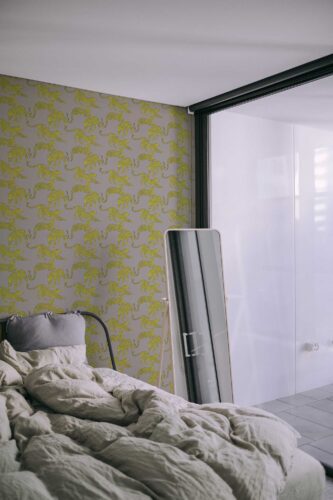 Removable animal print wallpaper in chartreuse and gray by Fancy Walls