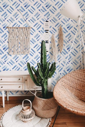 Bohemian style living room decorated with Watercolor Brush stroke peel and stick wallpaper