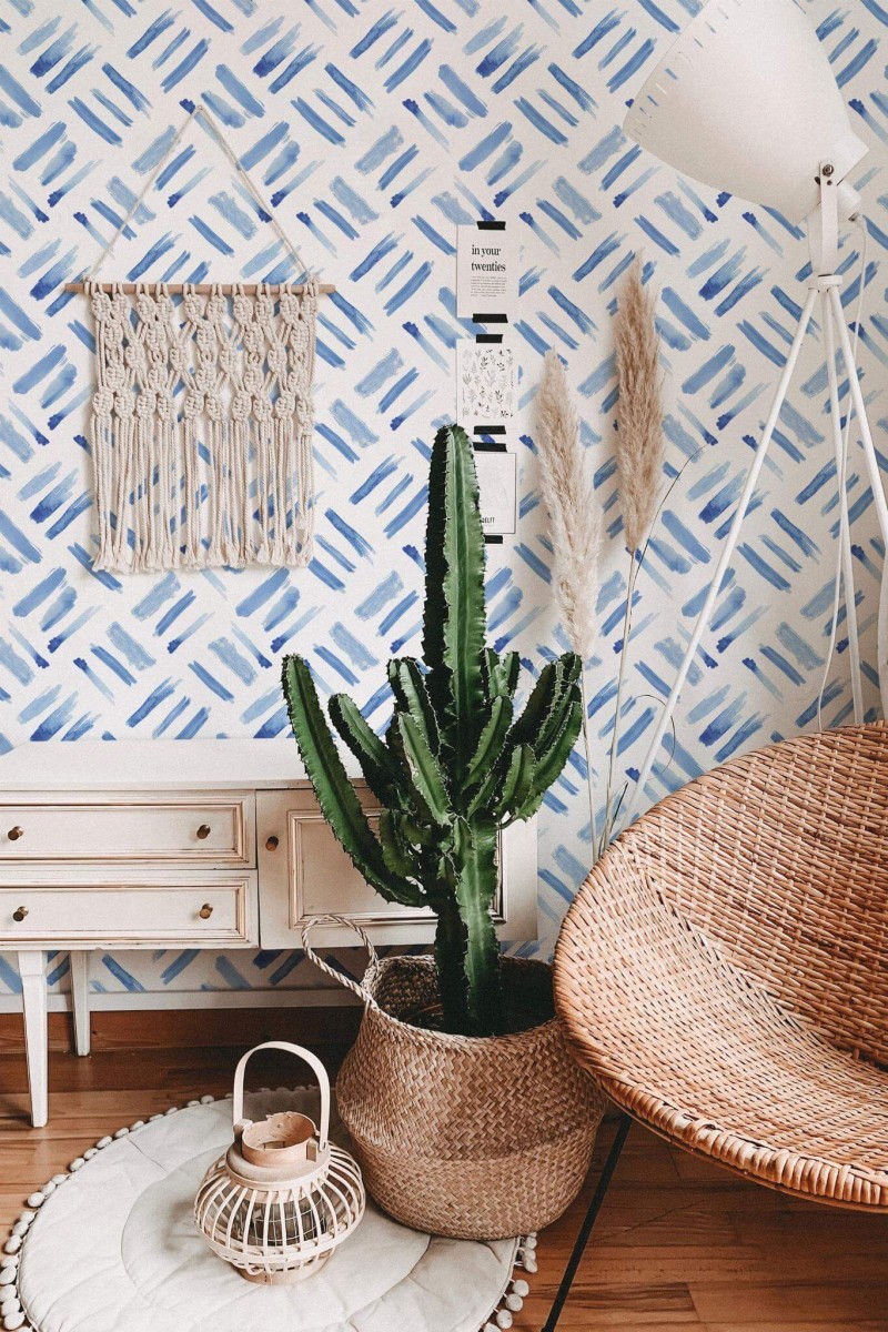Bohemian style living room decorated with Watercolor Brush stroke peel and stick wallpaper