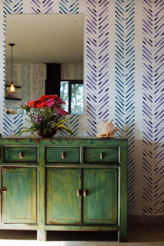 Industrial style living room decorated with Watercolor herringbone peel and stick wallpaper