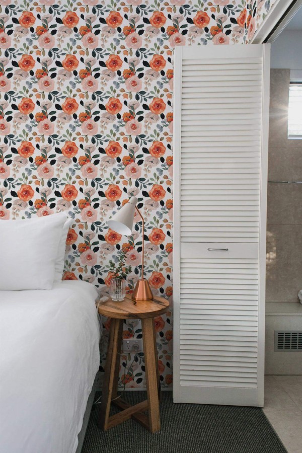 Minimalist style bedroom decorated with Watercolor rose peel and stick wallpaper