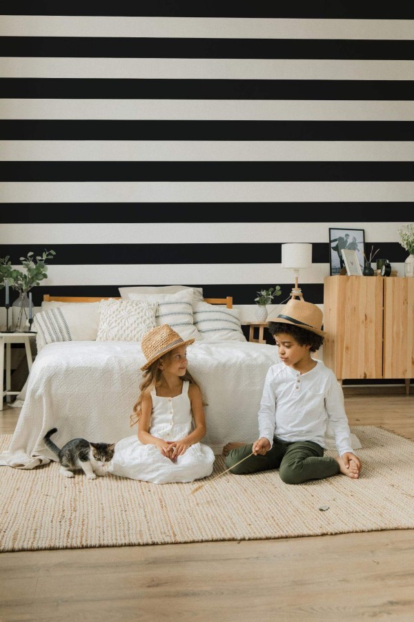 Scandinavian style bedroom decorated with Wide line peel and stick wallpaper