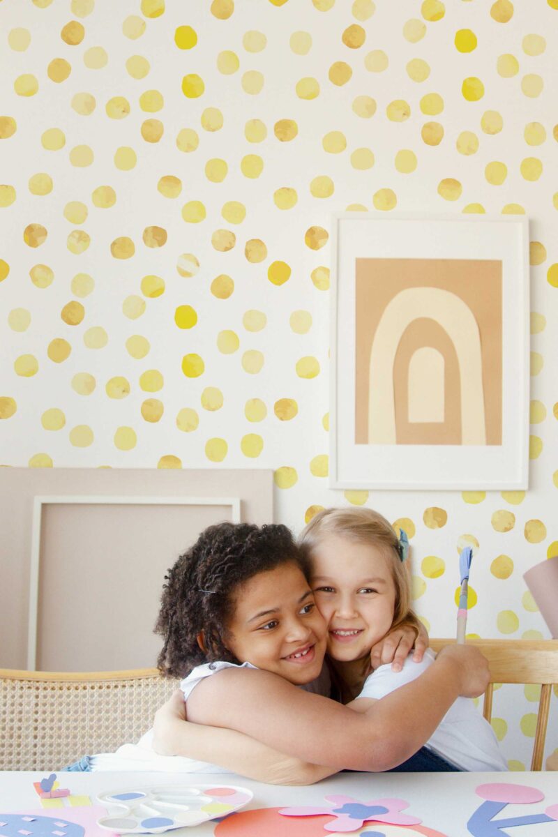Fancy Walls self-adhesive wallpaper featuring playful yellow dots on white