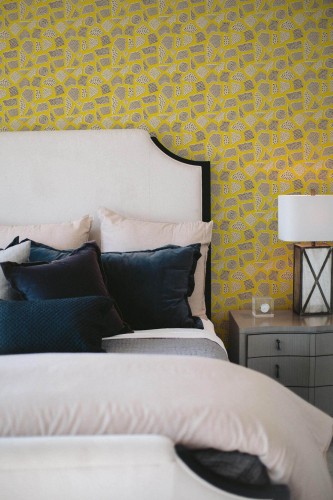 Shabby chic style bedroom decorated with Yellow terrazzo peel and stick wallpaper