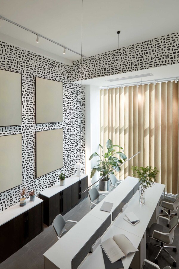 Fancy Walls removable wallpaper with irregular black dots and stripes
