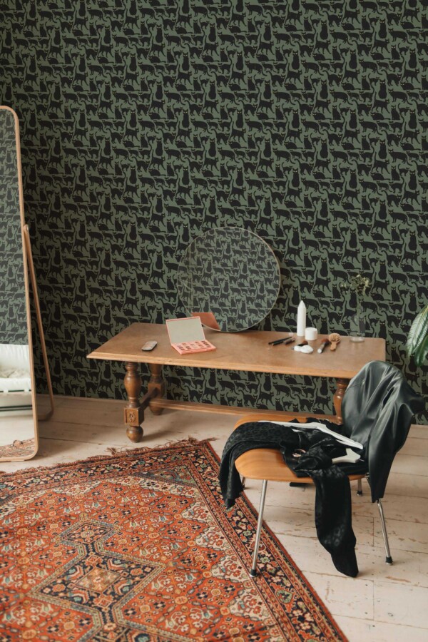 Fancy Walls peel and stick wallpaper with black cats on green background