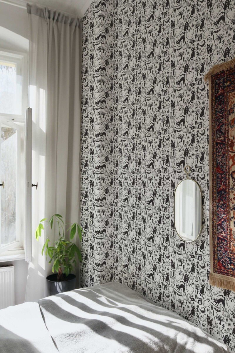 Fancy Walls self-adhesive wallpaper featuring cute Halloween doodles with owls and ghosts.
