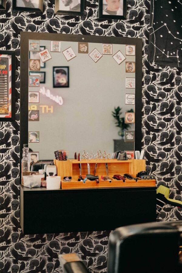 Fancy Walls peel and stick wallpaper with black and white skulls and crows.