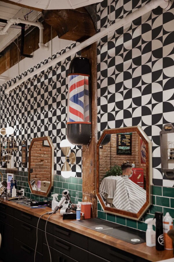 Fancy Walls peel and stick wallpaper with bold black and white geometric design.