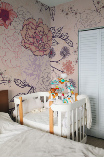 Soft Floral Wall Mural with pastel outlined flowers on a peach background, ideal for bedrooms with a calm aesthetic.